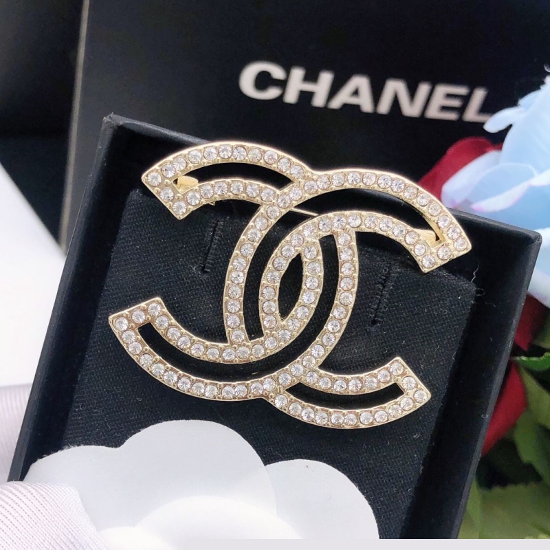 Ch*el brooches
